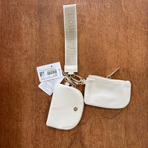 Lululemon dual pouch wristlet metallic wordmark light ivory